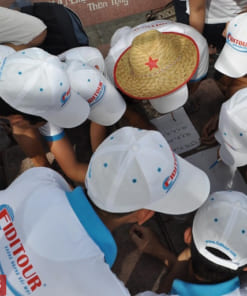 In logo lên mũ lưới trai Hà Nội