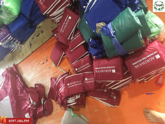 Giá áo mưa in logo